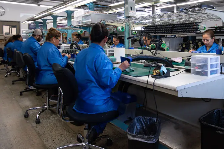 Assembly technicians at their stations