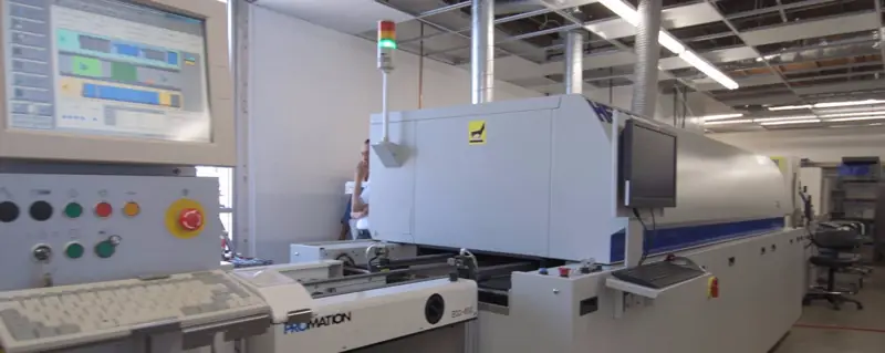 Boards moving through the SMT line